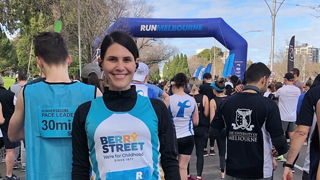 Natalie smiling outside at the Run Melbourne event