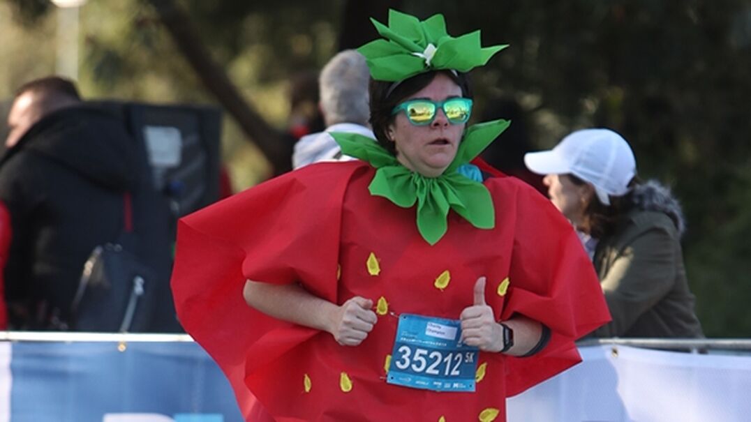 Run Melbourne contestant dressed in a strawberry costume