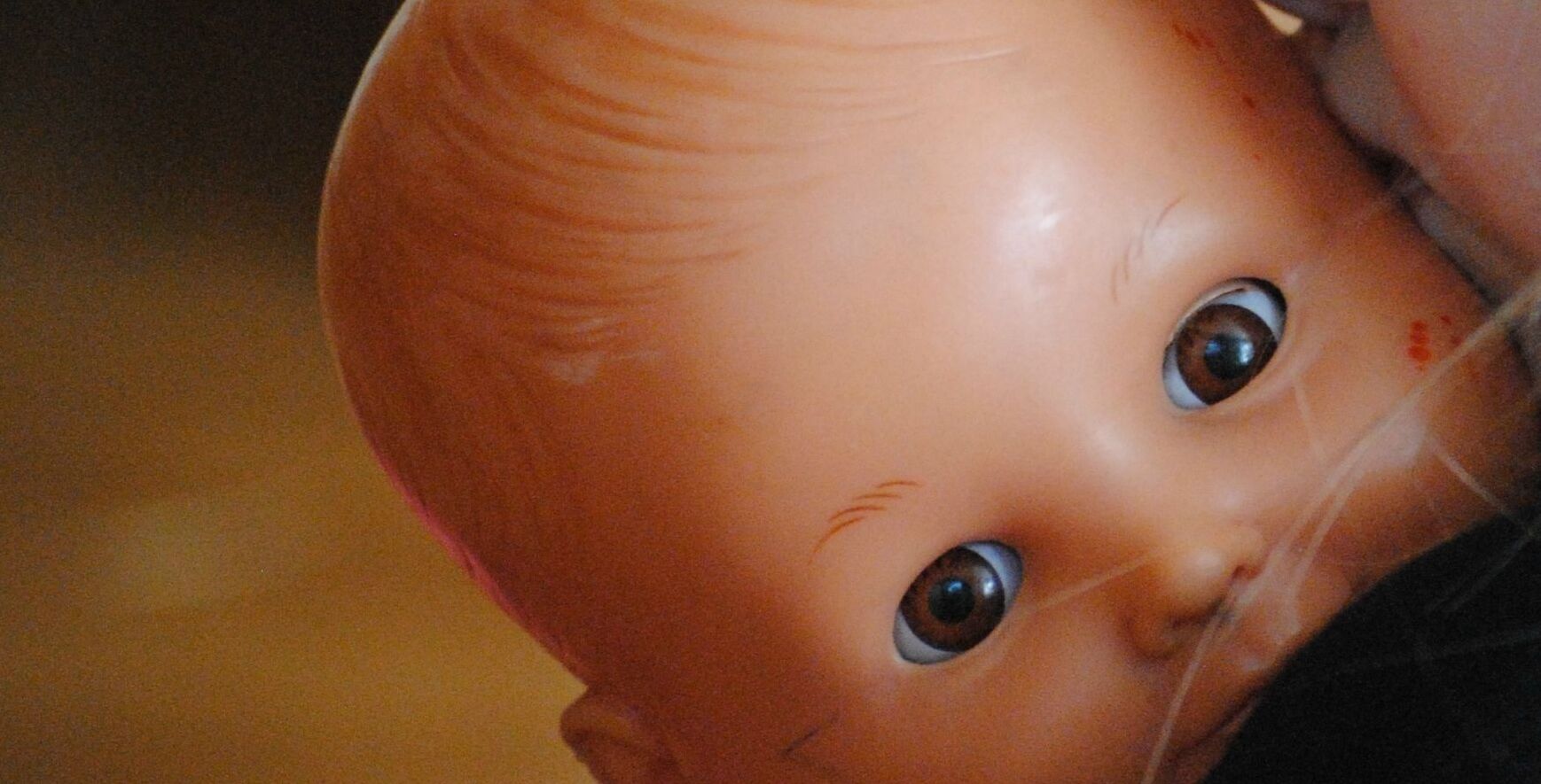 close up of baby doll face