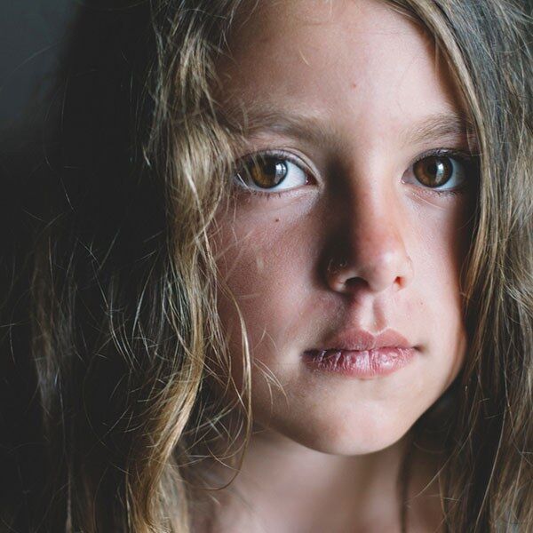 Young girl with neutral expression