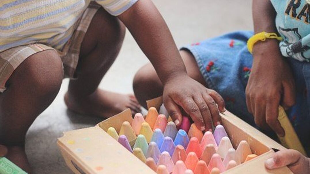 children playing with chalk