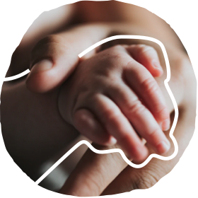 Adult's hand holding baby's hand